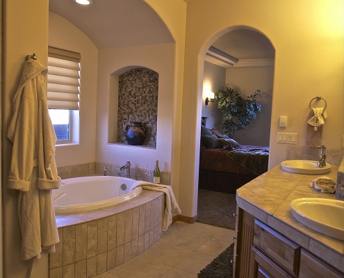 tall sinks arched walls master bathroom