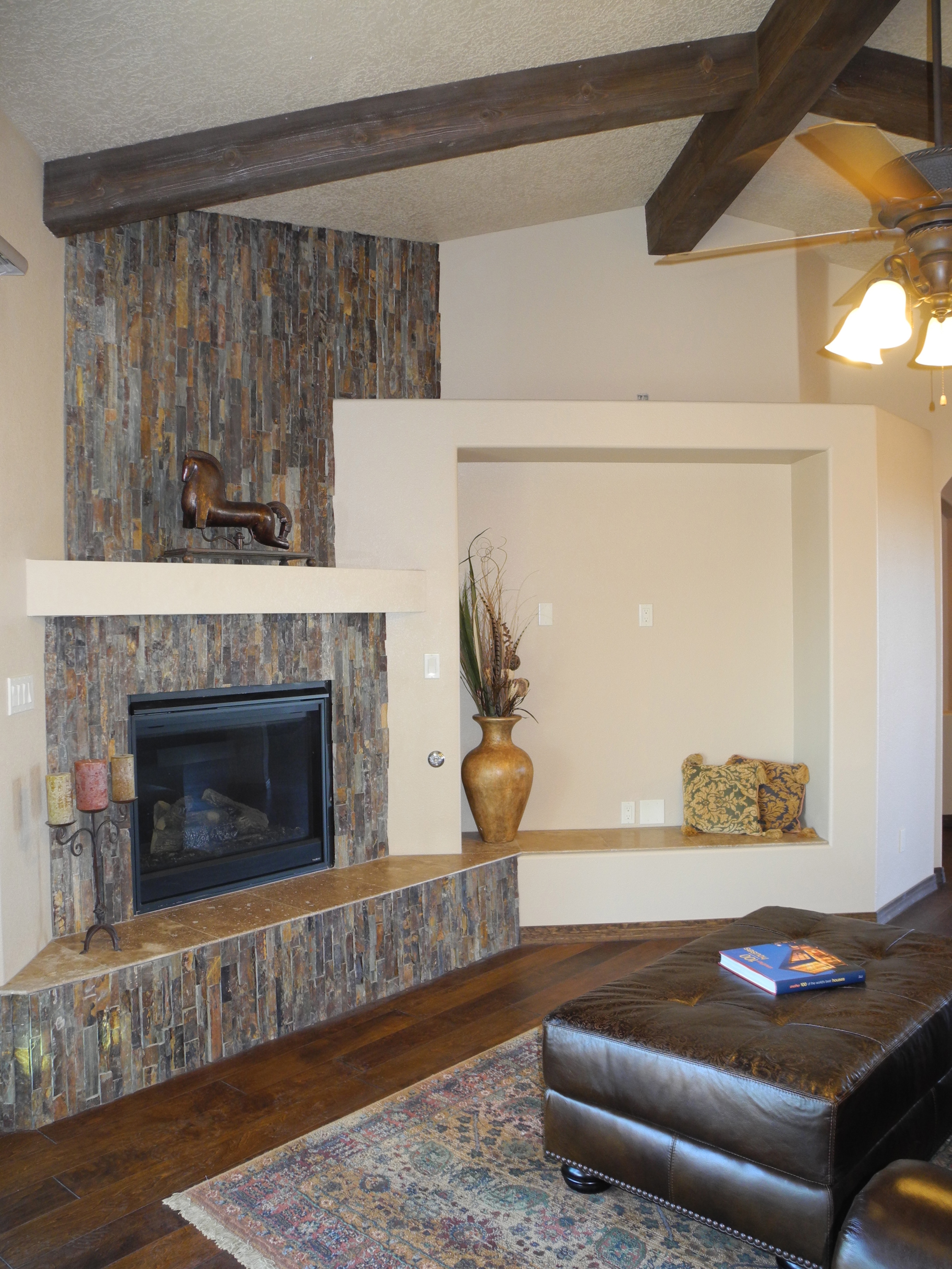 Quartz rock fireplace with box beams Lee Michael Homes Custom